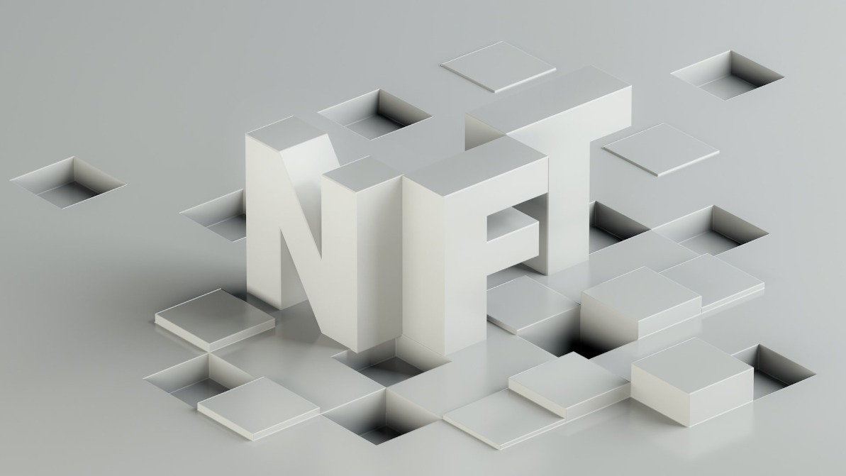 A render of the letters 'NFT' in white.